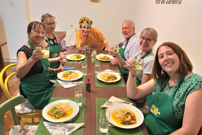 Brazilian Cooking Class in Copacabana with Hotel Pickup - Sautéing sausage and onions with cachaça