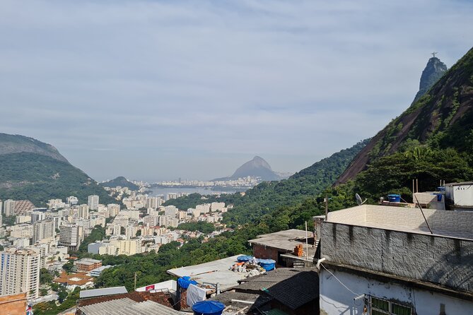 Favela tour Santa Marta with local guide - Two unusual home visits: clocks and family life