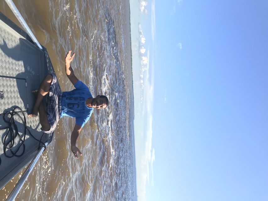 From Manuas: Full-Day River Tour - The Meeting of the Waters by speedboat
