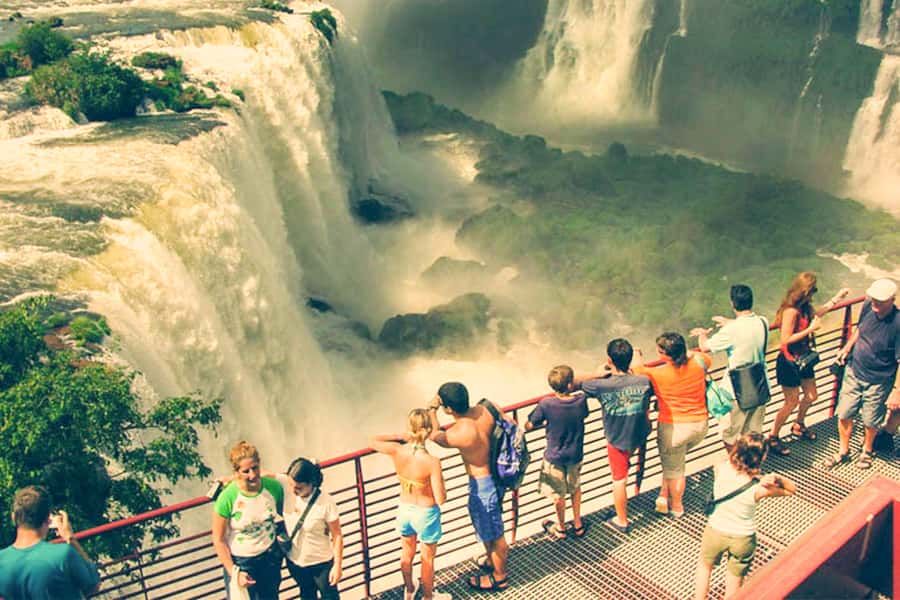 From Puerto Iguazu: Brazilian Falls with Boat Adventure - Entering Iguaçu National Park by electric vehicle
