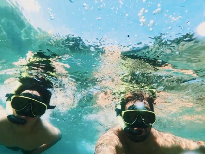 Paraty Bay: Islands & Beaches Boat Tour with Snorkeling - Stop one: swimming in a clear-water cove