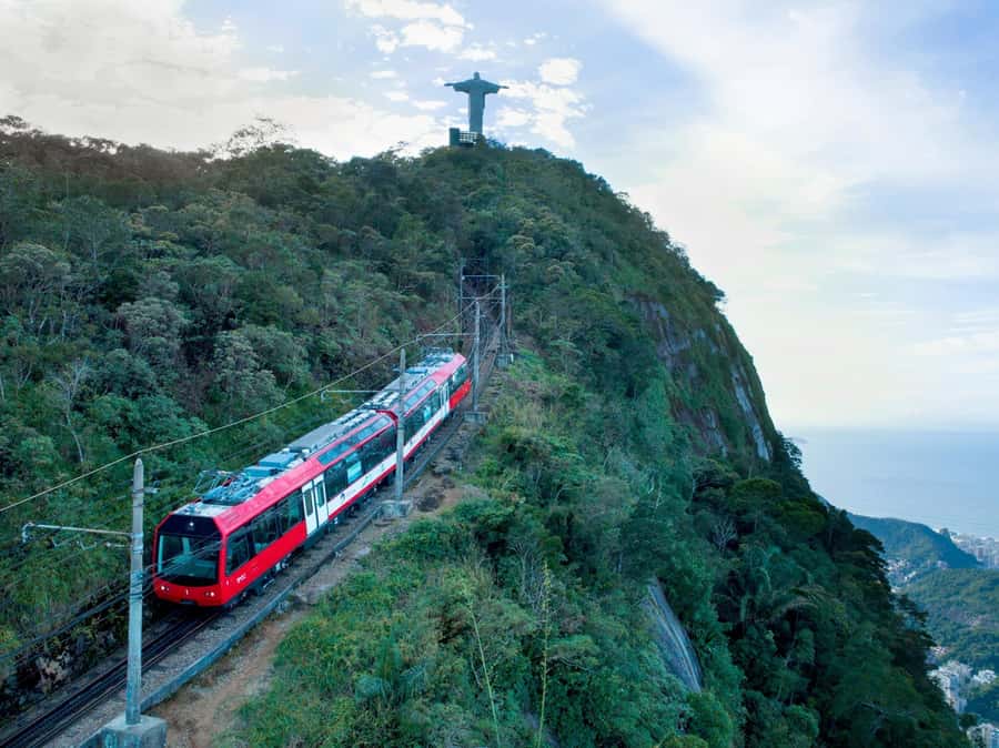 Rio de Janeiro: Corcovado Train & Sugarloaf Tour with Lunch - Taking the Corcovado Train through Tijuca Forest