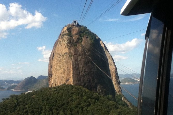 Rio Highlights Express: Christ, Sugarloaf & Beaches Half Day Tour. - Reaching Christ the Redeemer by train or van