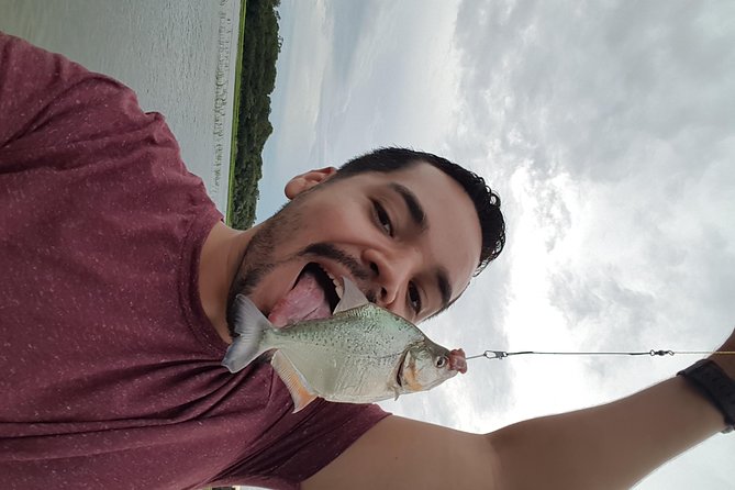 Solimoes River Piranha Fishing and Alligator Watching Tour - Piranha fishing before sunset