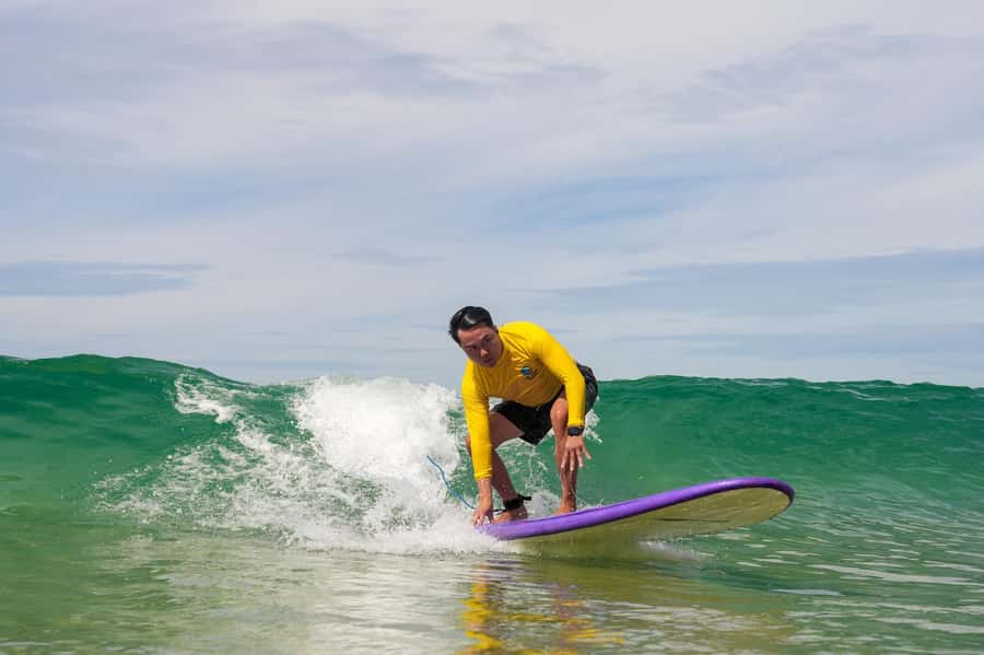 Surf lessons: in Arpoador in Ipanema. - Taking the board into the water