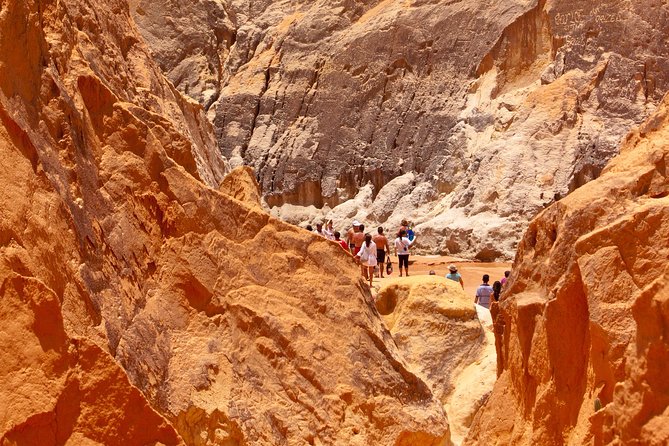 The colorful sands of Morro Branco beach - Full Day Tour - Why Morro Branco attracts film crews